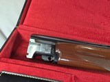 9207
Winchester 101 lightweight 12 gauge, screw in winchokes x 5 ( M, IM, XF, IC, SK) 27” barrels, 14 1/4 LOP, Butt pad, vent rib, ejectors, pistol g - 23 of 25