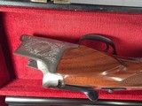 9207
Winchester 101 lightweight 12 gauge, screw in winchokes x 5 ( M, IM, XF, IC, SK) 27” barrels, 14 1/4 LOP, Butt pad, vent rib, ejectors, pistol g - 13 of 25