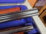 9214
Winchester 101 field skeet set, 20 gauge, 28 gauge, 410 gauge, all are 28” barrels, brass sight beads, butt plate, vent rib, all original, in fa - 16 of 23