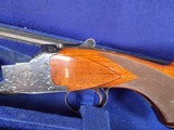 9214
Winchester 101 field skeet set, 20 gauge, 28 gauge, 410 gauge, all are 28” barrels, brass sight beads, butt plate, vent rib, all original, in fa - 5 of 23