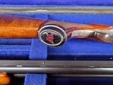 9214
Winchester 101 field skeet set, 20 gauge, 28 gauge, 410 gauge, all are 28” barrels, brass sight beads, butt plate, vent rib, all original, in fa - 10 of 23