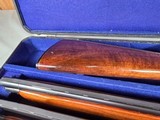 9214
Winchester 101 field skeet set, 20 gauge, 28 gauge, 410 gauge, all are 28” barrels, brass sight beads, butt plate, vent rib, all original, in fa - 12 of 23