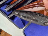 9214
Winchester 101 field skeet set, 20 gauge, 28 gauge, 410 gauge, all are 28” barrels, brass sight beads, butt plate, vent rib, all original, in fa - 7 of 23