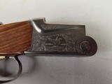 9215
SKB 605 Hunt Set 28 gauge With screw in chokes, M/F, 28” barrels
and 410 gauge is fixed IC/MOD, 26” barrels,
ejectors, single selective trigg - 10 of 25