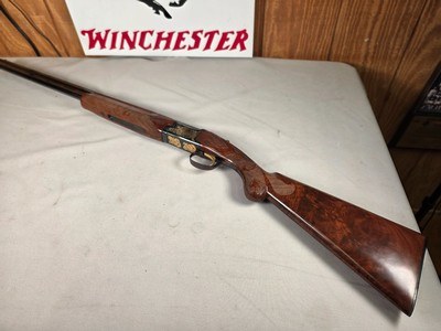 9216
Winchester 101 Texas Sequential 20 gauge, 27” barrel, 1 of only 100 made, gold Texas Map, Texas gold seal, AA++ fancy walnut, made in 1986, vent