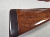 9217
Winchester model 21 SXS shotgun stock and forearm wood, will fit a 16 gauge or 20 gauge, walnut wood with a leather pad, approximately 15” LOP, - 16 of 25