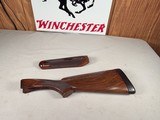 9217
Winchester model 21 SXS shotgun stock and forearm wood, will fit a 16 gauge or 20 gauge, walnut wood with a leather pad, approximately 15” LOP, - 1 of 25