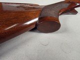 9217
Winchester model 21 SXS shotgun stock and forearm wood, will fit a 16 gauge or 20 gauge, walnut wood with a leather pad, approximately 15” LOP, - 18 of 25