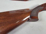 9217
Winchester model 21 SXS shotgun stock and forearm wood, will fit a 16 gauge or 20 gauge, walnut wood with a leather pad, approximately 15” LOP, - 15 of 25