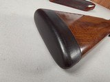 9217
Winchester model 21 SXS shotgun stock and forearm wood, will fit a 16 gauge or 20 gauge, walnut wood with a leather pad, approximately 15” LOP, - 17 of 25