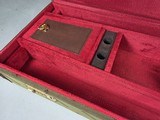 9218
Winchester green hard trunk style shotgun case, double barrel case, will hold two barrels up to 29”, beautiful like new condition. More pictures - 6 of 20