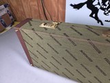 9218
Winchester green hard trunk style shotgun case, double barrel case, will hold two barrels up to 29”, beautiful like new condition. More pictures - 19 of 20