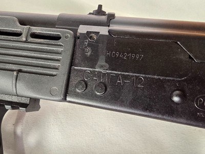 9219
Izhmash Saiga
12, 12 gauge tatical shotgun, made in Russa, semi auto, mag fed, (NO MAG Included) , foldable stock, compensator, side accessory