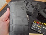9220
308 Win ammo, magazines, mag sling pouch and ammo box, this collection comes with 7- 25 round magpull magazines with 308 ammo loaded in each one - 17 of 23
