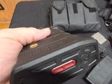 9220
308 Win ammo, magazines, mag sling pouch and ammo box, this collection comes with 7- 25 round magpull magazines with 308 ammo loaded in each one - 21 of 23