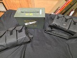 9220
308 Win ammo, magazines, mag sling pouch and ammo box, this collection comes with 7- 25 round magpull magazines with 308 ammo loaded in each one - 23 of 23