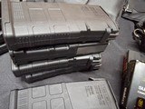 9220
308 Win ammo, magazines, mag sling pouch and ammo box, this collection comes with 7- 25 round magpull magazines with 308 ammo loaded in each one - 4 of 23