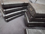 9220
308 Win ammo, magazines, mag sling pouch and ammo box, this collection comes with 7- 25 round magpull magazines with 308 ammo loaded in each one - 3 of 23