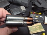 9220
308 Win ammo, magazines, mag sling pouch and ammo box, this collection comes with 7- 25 round magpull magazines with 308 ammo loaded in each one - 12 of 23