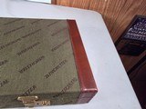9222
Winchester green shotgun trunk style case with red interior, New old stock, will hot up to a 26” barrel.
With original keys and key fob.More pi - 10 of 18