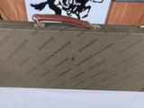 9222
Winchester green shotgun trunk style case with red interior, New old stock, will hot up to a 26” barrel.
With original keys and key fob.More pi - 17 of 18