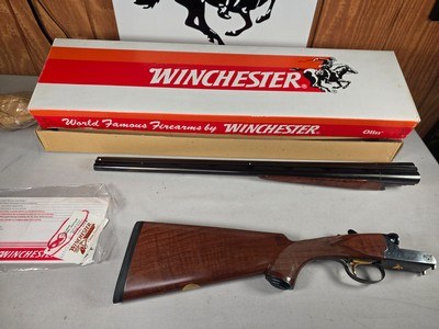 9221
Winchester 23 Classic, 20 Gauge, pistol grip, 14 1/4 LOP, 26” barrels, IC/MOD fixed chokes, vent rib, single trigger, like new in original box w