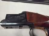 9223
Browning Citori 12 gauge, straight grip, butt plate, 26” barrels, 14 1/4 LOP, Screw in chokes, metal front sight, vent rib, with original box, M - 9 of 25