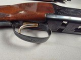 9223
Browning Citori 12 gauge, straight grip, butt plate, 26” barrels, 14 1/4 LOP, Screw in chokes, metal front sight, vent rib, with original box, M - 13 of 25
