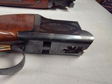 9223
Browning Citori 12 gauge, straight grip, butt plate, 26” barrels, 14 1/4 LOP, Screw in chokes, metal front sight, vent rib, with original box, M - 12 of 25