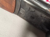 9228
SKB 285 20 Gauge, 28” barrels, IC/IC, 2 3/3 and 3” chambers, red front site, ejectors, single selective trigger, neutral mid bead, straight grip - 11 of 25