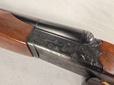 9228
SKB 285 20 Gauge, 28” barrels, IC/IC, 2 3/3 and 3” chambers, red front site, ejectors, single selective trigger, neutral mid bead, straight grip - 24 of 25