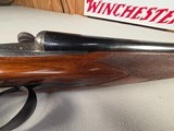 9230
Darne R-Grade, made in France,
Engraved side by side shotgun, 27” barrels, made in the early 1900’s, 12 gauge, straight grip, sling swivels, so - 22 of 25
