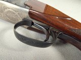 9233
Winchester 101 XTR lightweight 12 gauge, 27” barrels, 2 screw in Winchokes, IC/MOD, vent rib, pistol grip, bull pad, solver coin engraved receiv - 8 of 25