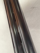9233
Winchester 101 XTR lightweight 12 gauge, 27” barrels, 2 screw in Winchokes, IC/MOD, vent rib, pistol grip, bull pad, solver coin engraved receiv - 25 of 25