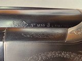 9233
Winchester 101 XTR lightweight 12 gauge, 27” barrels, 2 screw in Winchokes, IC/MOD, vent rib, pistol grip, bull pad, solver coin engraved receiv - 15 of 25