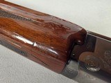 9233
Winchester 101 XTR lightweight 12 gauge, 27” barrels, 2 screw in Winchokes, IC/MOD, vent rib, pistol grip, bull pad, solver coin engraved receiv - 11 of 25