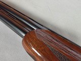 9233
Winchester 101 XTR lightweight 12 gauge, 27” barrels, 2 screw in Winchokes, IC/MOD, vent rib, pistol grip, bull pad, solver coin engraved receiv - 23 of 25
