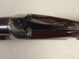 9233
Winchester 101 XTR lightweight 12 gauge, 27” barrels, 2 screw in Winchokes, IC/MOD, vent rib, pistol grip, bull pad, solver coin engraved receiv - 17 of 25