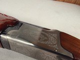 9233
Winchester 101 XTR lightweight 12 gauge, 27” barrels, 2 screw in Winchokes, IC/MOD, vent rib, pistol grip, bull pad, solver coin engraved receiv - 10 of 25