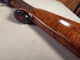 9236
Ruger Red Label, 20 Gauge, 26” Barrels, IC/MOD fixed chokes, AAA++ tiger striped walnut, pistol grip with cap, 100% all original, butt pad, vent - 4 of 25 9236
Ruger Red Label, 20 Gauge, 26” Barrels, IC/MOD fixed chokes, AAA++ tiger striped walnut, pistol grip with cap, 100% all original, butt pad, vent - 4 of 25