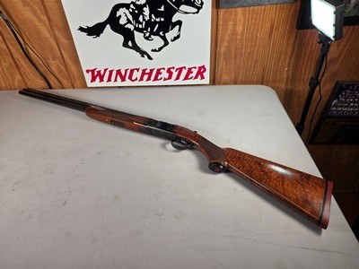 9236
Ruger Red Label, 20 Gauge, 26” Barrels, IC/MOD fixed chokes, AAA++ tiger striped walnut, pistol grip with cap, 100% all original, butt pad, vent