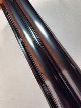 9236
Ruger Red Label, 20 Gauge, 26” Barrels, IC/MOD fixed chokes, AAA++ tiger striped walnut, pistol grip with cap, 100% all original, butt pad, vent - 20 of 25 9236
Ruger Red Label, 20 Gauge, 26” Barrels, IC/MOD fixed chokes, AAA++ tiger striped walnut, pistol grip with cap, 100% all original, butt pad, vent - 20 of 25