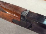 9236
Ruger Red Label, 20 Gauge, 26” Barrels, IC/MOD fixed chokes, AAA++ tiger striped walnut, pistol grip with cap, 100% all original, butt pad, vent - 10 of 25 9236
Ruger Red Label, 20 Gauge, 26” Barrels, IC/MOD fixed chokes, AAA++ tiger striped walnut, pistol grip with cap, 100% all original, butt pad, vent - 10 of 25