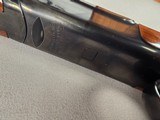 9236
Ruger Red Label, 20 Gauge, 26” Barrels, IC/MOD fixed chokes, AAA++ tiger striped walnut, pistol grip with cap, 100% all original, butt pad, vent - 9 of 25 9236
Ruger Red Label, 20 Gauge, 26” Barrels, IC/MOD fixed chokes, AAA++ tiger striped walnut, pistol grip with cap, 100% all original, butt pad, vent - 9 of 25