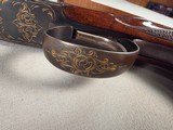 9239
Winchester 101 20 gauge, 26” Barrels, SK/SK, Gold Dama scene, Butt pad, pistol grip with red “W” cap, 13 5/8 LOP, two brass beads, ejectors, ven - 6 of 25
