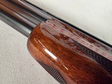 9239
Winchester 101 20 gauge, 26” Barrels, SK/SK, Gold Dama scene, Butt pad, pistol grip with red “W” cap, 13 5/8 LOP, two brass beads, ejectors, ven - 14 of 25