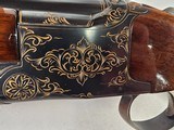 9239
Winchester 101 20 gauge, 26” Barrels, SK/SK, Gold Dama scene, Butt pad, pistol grip with red “W” cap, 13 5/8 LOP, two brass beads, ejectors, ven - 17 of 25
