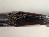 9239
Winchester 101 20 gauge, 26” Barrels, SK/SK, Gold Dama scene, Butt pad, pistol grip with red “W” cap, 13 5/8 LOP, two brass beads, ejectors, ven - 19 of 25