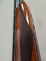 9239
Winchester 101 20 gauge, 26” Barrels, SK/SK, Gold Dama scene, Butt pad, pistol grip with red “W” cap, 13 5/8 LOP, two brass beads, ejectors, ven - 23 of 25