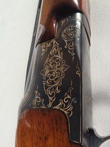 9239
Winchester 101 20 gauge, 26” Barrels, SK/SK, Gold Dama scene, Butt pad, pistol grip with red “W” cap, 13 5/8 LOP, two brass beads, ejectors, ven - 25 of 25